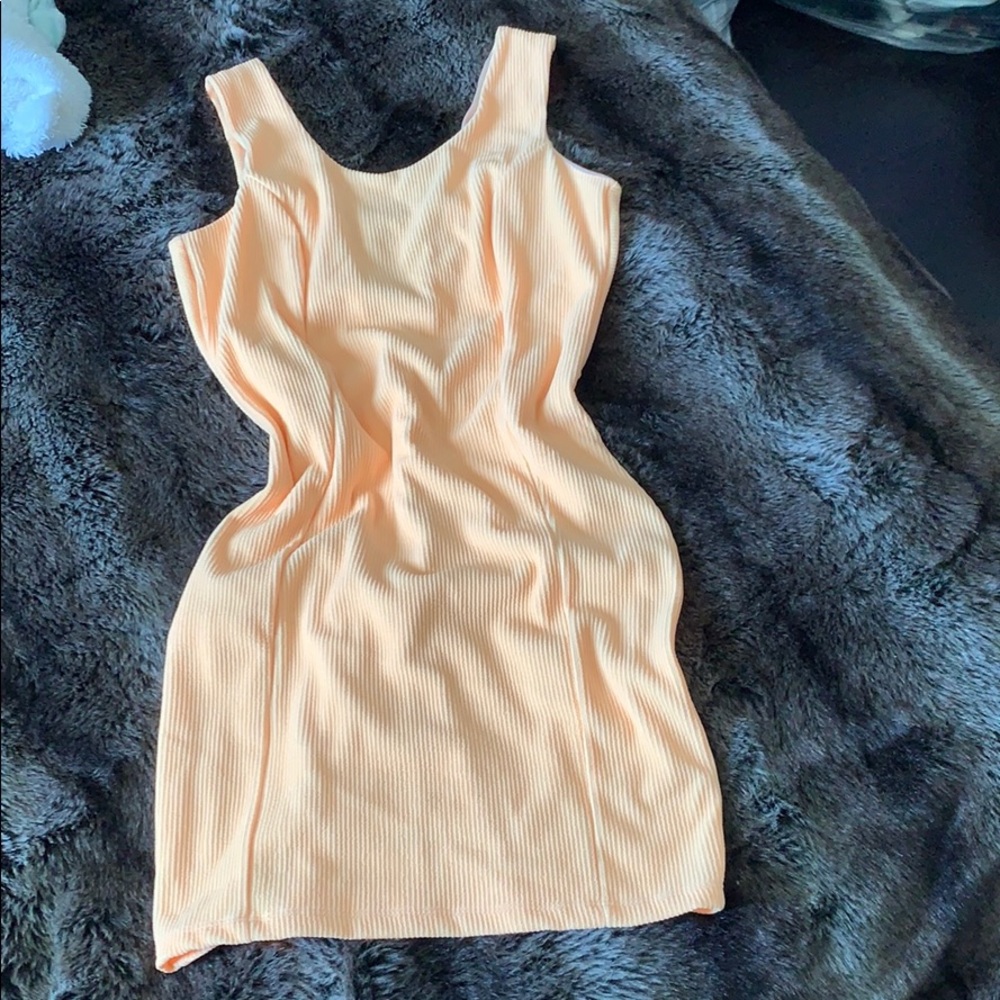 Brand new open back fitted dress
